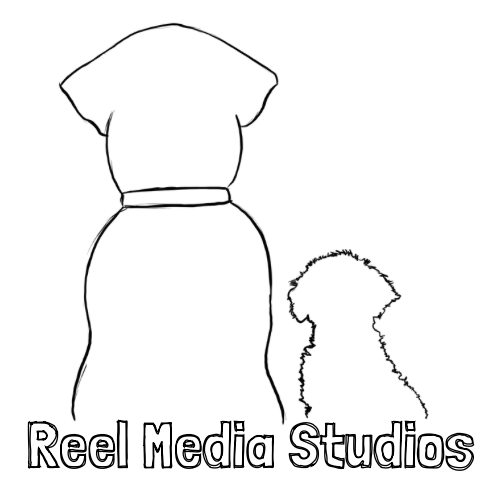 Logo for Reel Media Studios featuring a simple black outline of two dogs sitting side by side, viewed from behind. One dog is larger with a broad head and a collar, while the other is smaller and curly-haired. Below the dogs, the text 'Reel Media Studios' appears in a playful, outlined font.